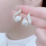Elegant Simulated Pearl and Rhinestone Stud Earrings - Image 9